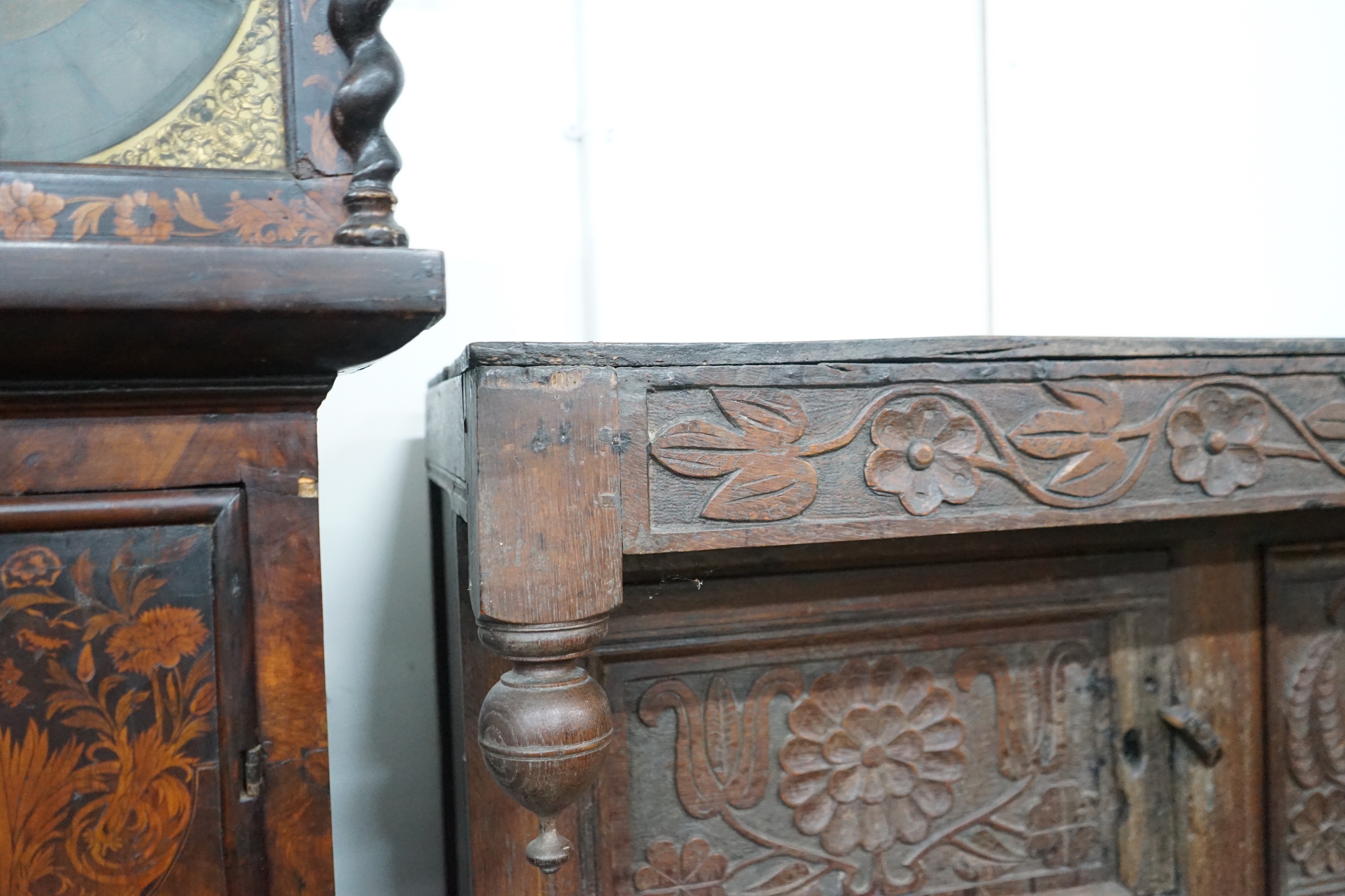 A 17th century carved oak court cupboard, dated 1685, width 170cm, depth 55cm, height 150cm